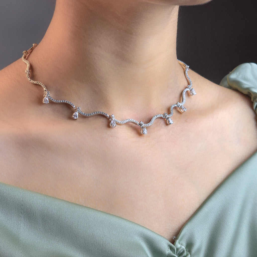 Necklace worn by a person with a blurred background