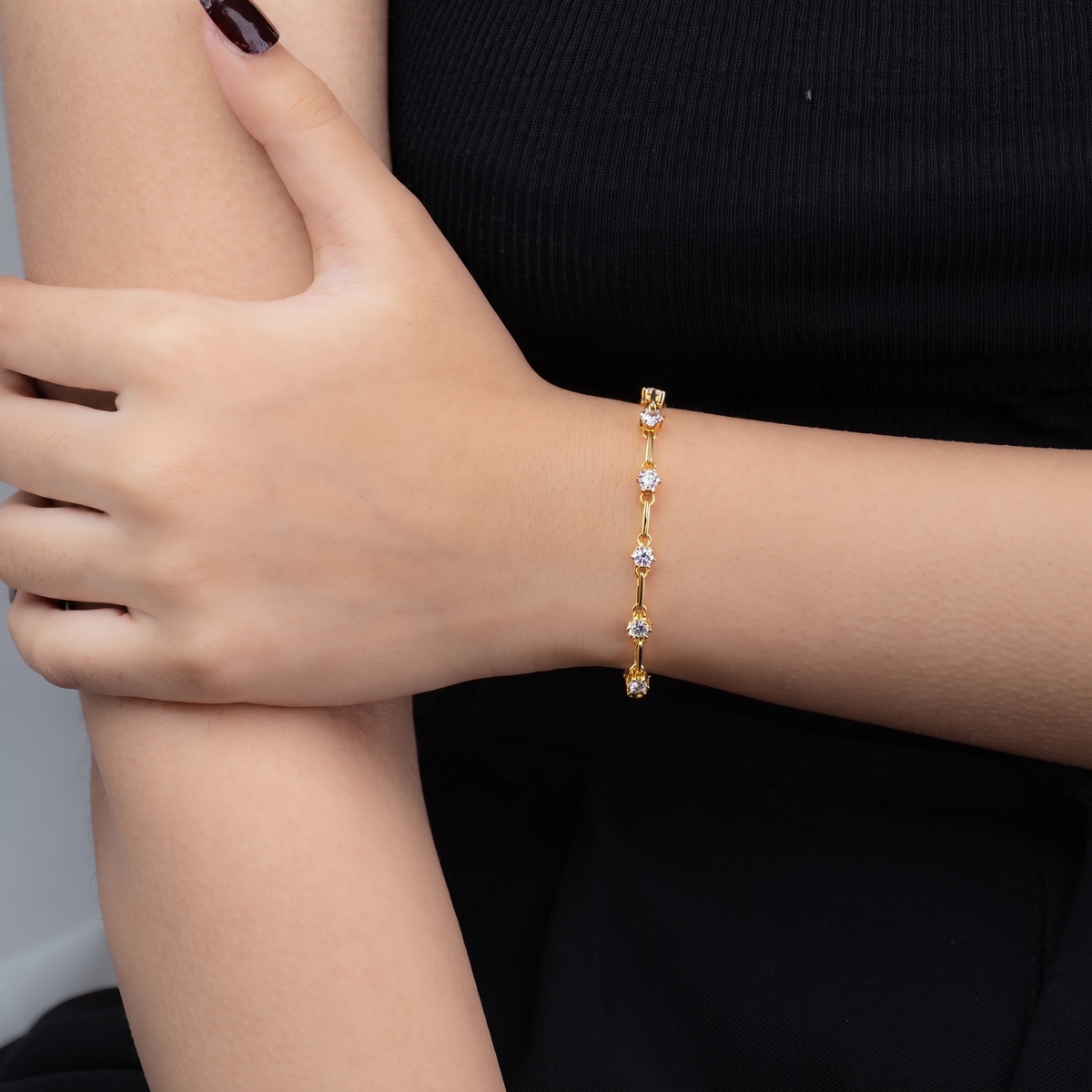 Soleil Tennis Bracelet — gold station bracelet worn on wrist