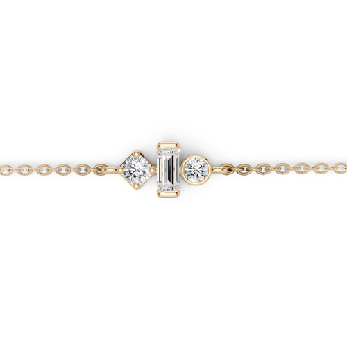 Gold bracelet with diamond accents on a white background