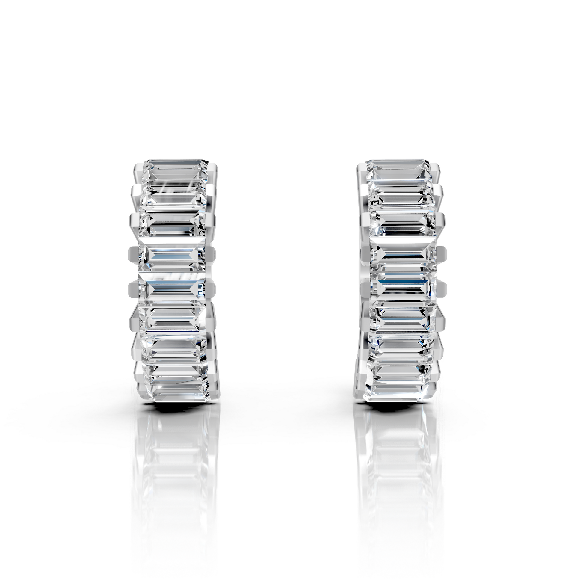Pair of emerald cut earrings on a white background