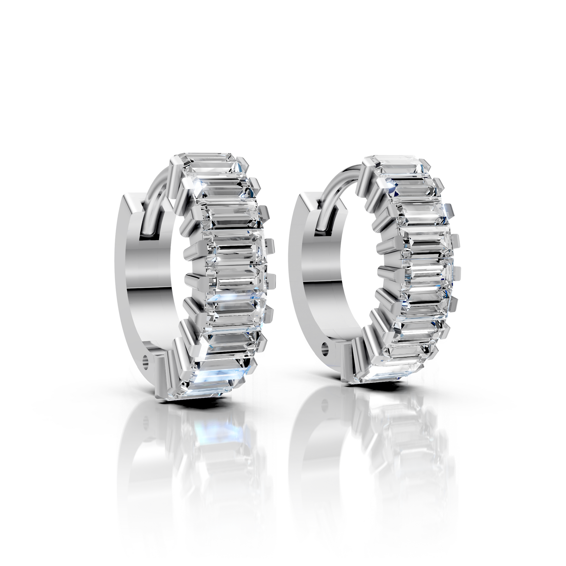 Pair of silver hoop earrings with clear gemstones on a white background