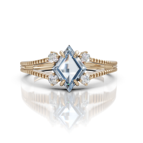 Gold ring with a central blue gemstone and smaller diamonds on a white background