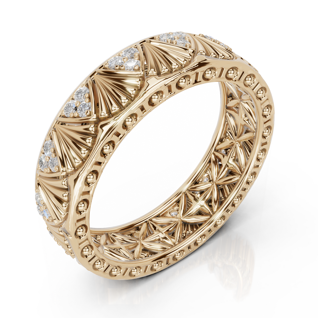 Gold ring with intricate design and embedded diamonds on a white background