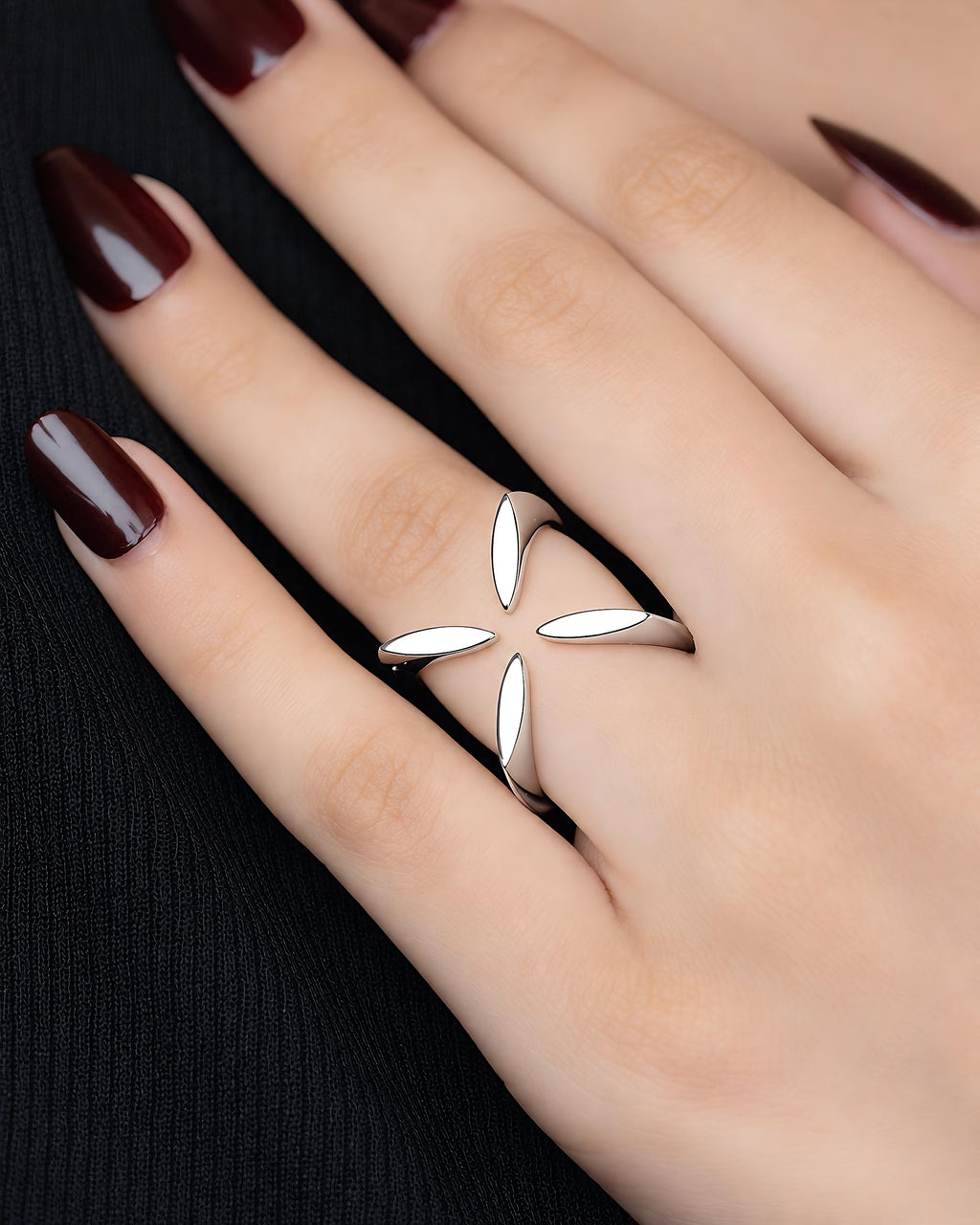 The 'X' Ring worn